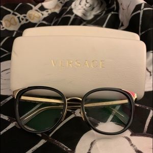 Versace black and gold rimmed eyeglass frames